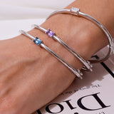 - The Radiant London Blue Topaz Bracelet -